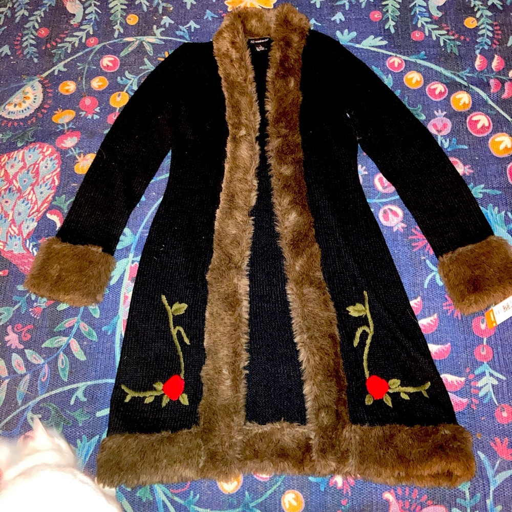 Black and brown sweater coat. 🌹 roses.